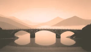 Monochromatic sepia-toned landscape with a stone arch bridge reflecting in the still water of the Everviz case study.